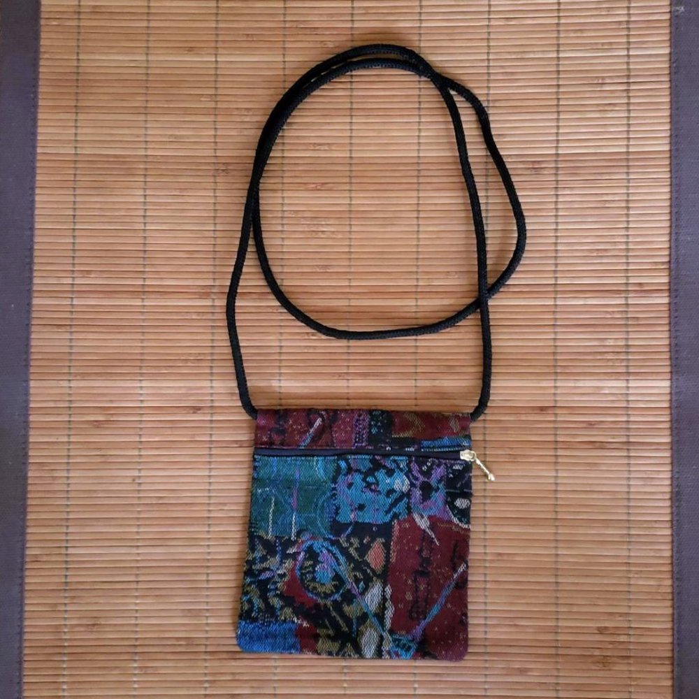 Embroidered clutch